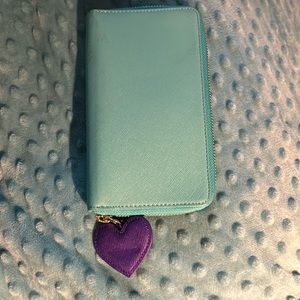 Talbots leather turquoise phone wallet. Fits my 14 IPhone.
